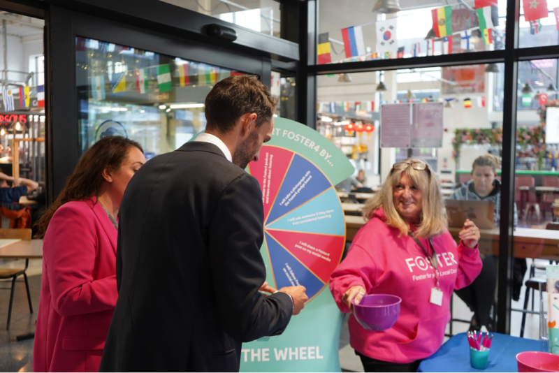 Childcare Minister Josh MacAlister speaks to staff at the Foster4 Recruitment Hub